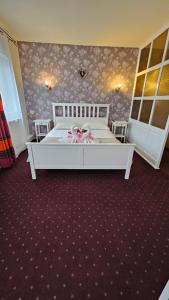 Voodi või voodid majutusasutuse Hotel Olimp toas