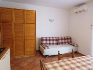 Postel nebo postele na pokoji v ubytování Apartments INES
