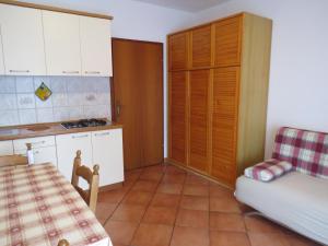 Kuchyň nebo kuchyňský kout v ubytování Apartments INES