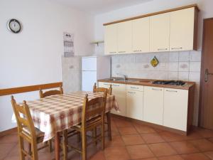 Kuchyň nebo kuchyňský kout v ubytování Apartments INES