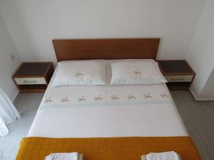 Postel nebo postele na pokoji v ubytování Apartments INES