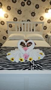 Voodi või voodid majutusasutuse Hotel Olimp toas