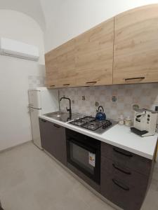 Kuchyň nebo kuchyňský kout v ubytování Fior dell'Etna