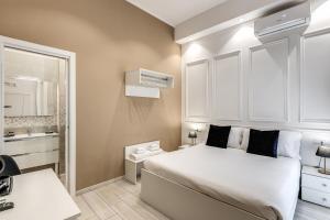 Tempat tidur dalam kamar di Raggio di sole 2