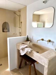 A bed or beds in a room at Trullo Falco