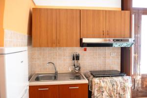 Kuchyň nebo kuchyňský kout v ubytování Casa Lucia - Siti storici e Saline Naturali - Pet Friendly + 8 fotografií
