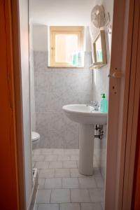 Kylpyhuone majoituspaikassa Kasaluka - The Typical Italians