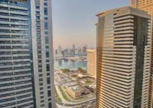 a view of a city skyline from a building at Key View - Marina Torch in Dubai