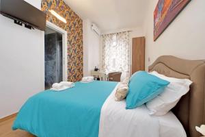 Postel nebo postele na pokoji v ubytování Misa Guest House San Lorenzo