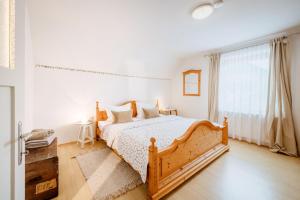 Postel nebo postele na pokoji v ubytování Ferienhaus Classic + 12 fotografií