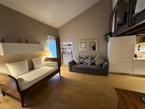 Posteľ alebo postele v izbe v ubytovaní Domus Suites Verona