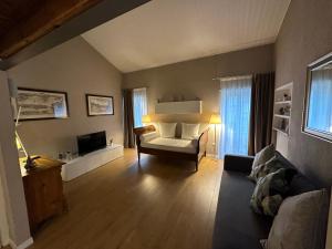 Posteľ alebo postele v izbe v ubytovaní Domus Suites Verona