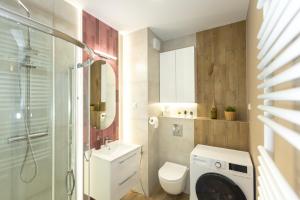 Ванная комната в A4 Apartament Oscar