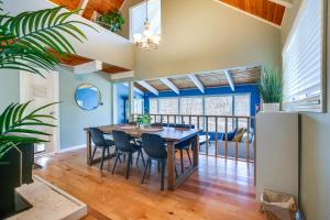 a dining room with a table and chairs at Renton Home with Fire Pit and Nearby Lake Access! in Renton