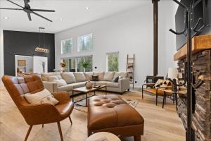 a living room filled with furniture and a fireplace at Beauty Bay Stunner in Coeur d'Alene