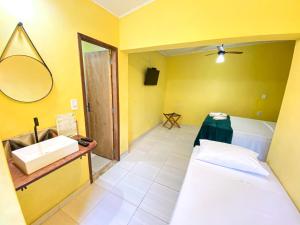 Pousada Jardim Lençóis客房内的一张或多张床位
