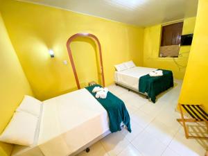 Pousada Jardim Lençóis客房内的一张或多张床位