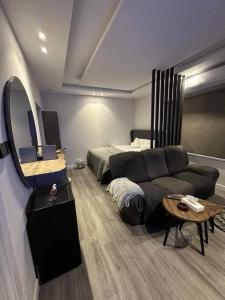 Ένα ή περισσότερα κρεβάτια σε δωμάτιο στο Nice cozy studio close to KAFD
