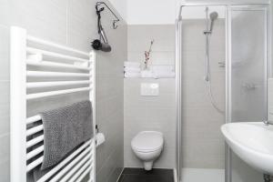 Ein Badezimmer in der Unterkunft Aparthotel Lenau