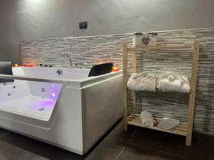 Fotografia z galérie ubytovania Fabianna suite v destinácii Agliano Terme