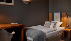 Llit o llits en una habitació de YoHo - The Young Hotel