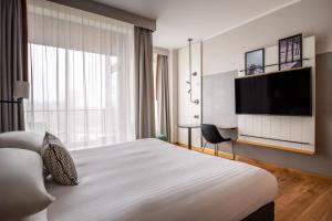 TV a/nebo společenská místnost v ubytování Sopot Marriott Resort & Spa + 37 fotografií