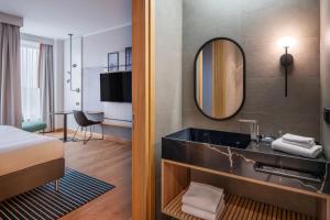 a hotel room with a bathroom with a sink at Sopot Marriott Resort & Spa in Sopot