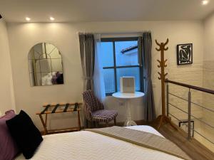 Postel nebo postele na pokoji v ubytování Adamas House Hotel Boutique