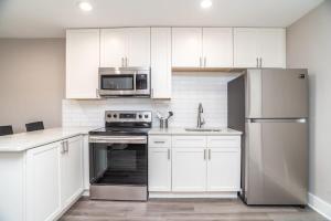 Køkken eller tekøkken på Close to everything fun Free Parking LM1704