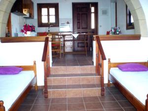 Postel nebo postele na pokoji v ubytování Patmos Garden Sea