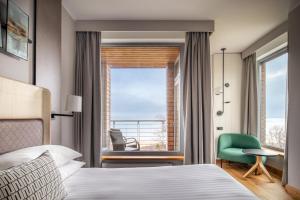 Postel nebo postele na pokoji v ubytování Sopot Marriott Resort & Spa