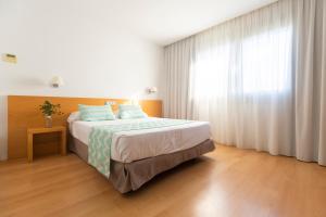Postel nebo postele na pokoji v ubytování Daniya Alicante