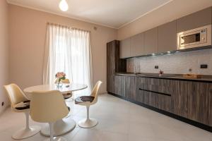 Dapur atau dapur kecil di Casa Bianca Bruino, privacy e confort