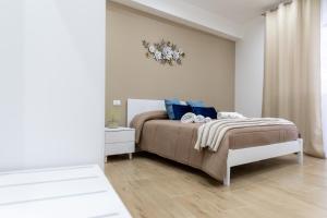 Postel nebo postele na pokoji v ubytování ARIA b&b