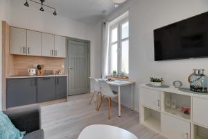 Кухня или мини-кухня в Dom & House - Apartment Sea Of Mint
