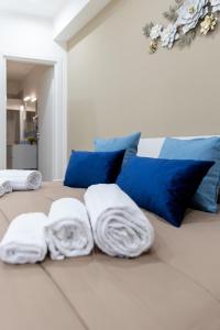 Postel nebo postele na pokoji v ubytování ARIA b&b