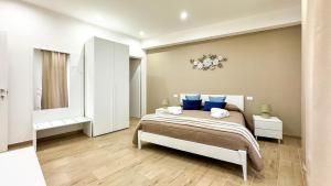 Postel nebo postele na pokoji v ubytování ARIA b&b