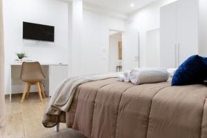 Postel nebo postele na pokoji v ubytování ARIA b&b