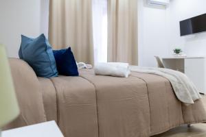 Postel nebo postele na pokoji v ubytování ARIA b&b