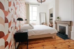 Postel nebo postele na pokoji v ubytování Maison Martouret - Colodge
