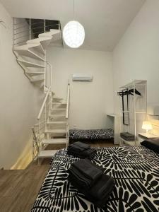 Postel nebo postele na pokoji v ubytování Corte Del Carmine