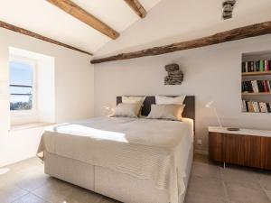 Ένα ή περισσότερα κρεβάτια σε δωμάτιο στο Holiday Home Casa Serena by Interhome
