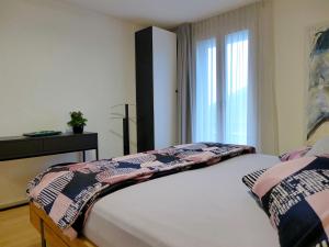 Postel nebo postele na pokoji v ubytování Apartment Beatrice Garden by Interhome