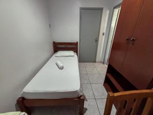 Postel nebo postele na pokoji v ubytování Carlton Express Imbiara