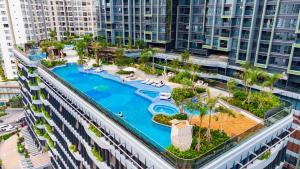 an aerial view of a pool on a apartment building at LUMIÈRE RESIDENT LUXURY SUITE in Ho Chi Minh City