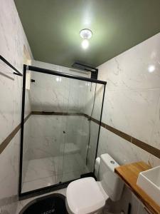Bilik mandi di Aconchegante Suite green