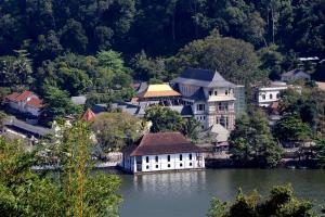 an image of a town on the water at Green Bird Villas in Kandy