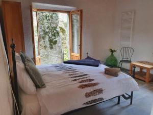 Postel nebo postele na pokoji v ubytování Rustico Lago di Como b&b