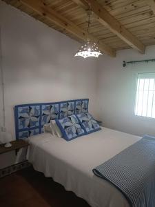 Postel nebo postele na pokoji v ubytování Finca del Abu