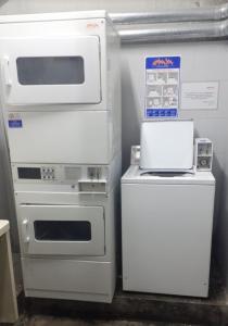 a kitchen with two ovens and a small refrigerator at CABELLO SQUARE Security 24hs in Buenos Aires